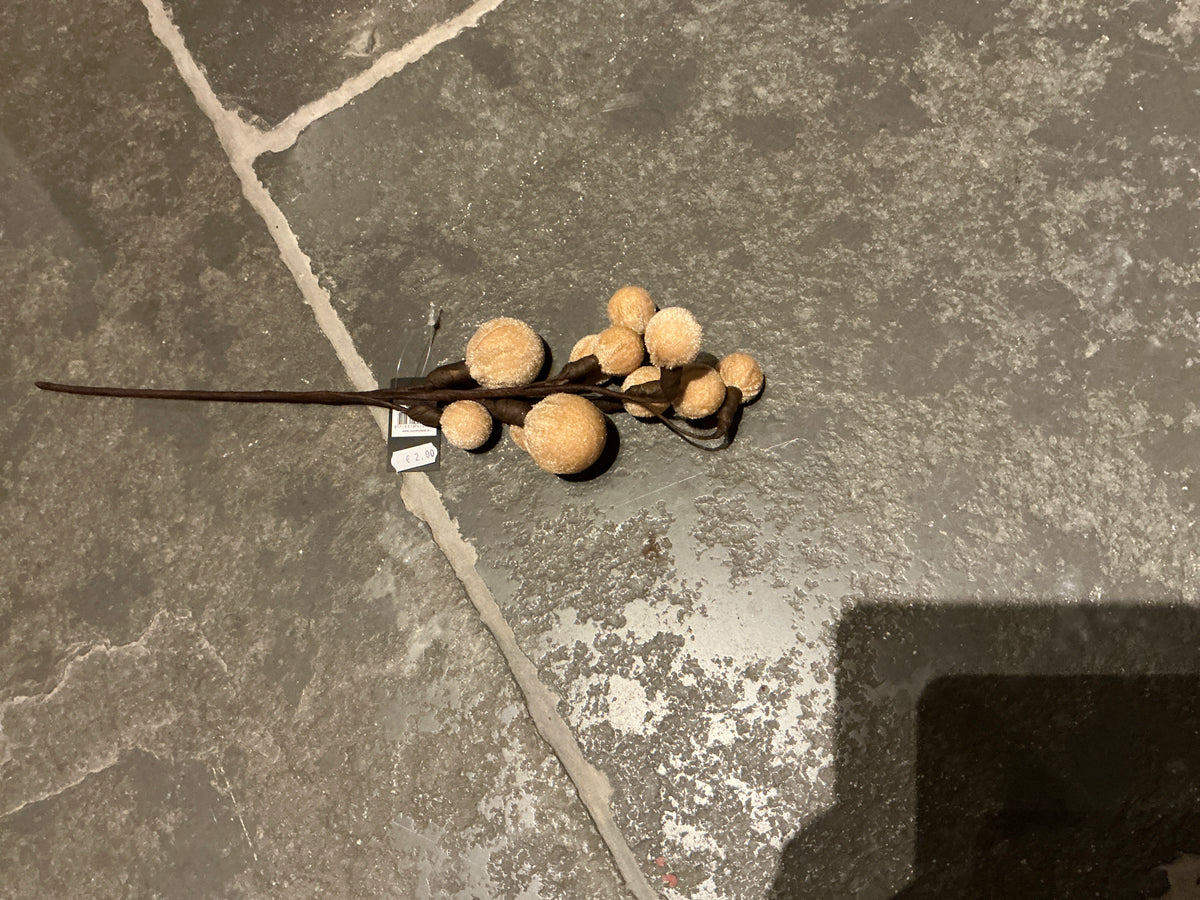 Stokje met bolletjes beige
