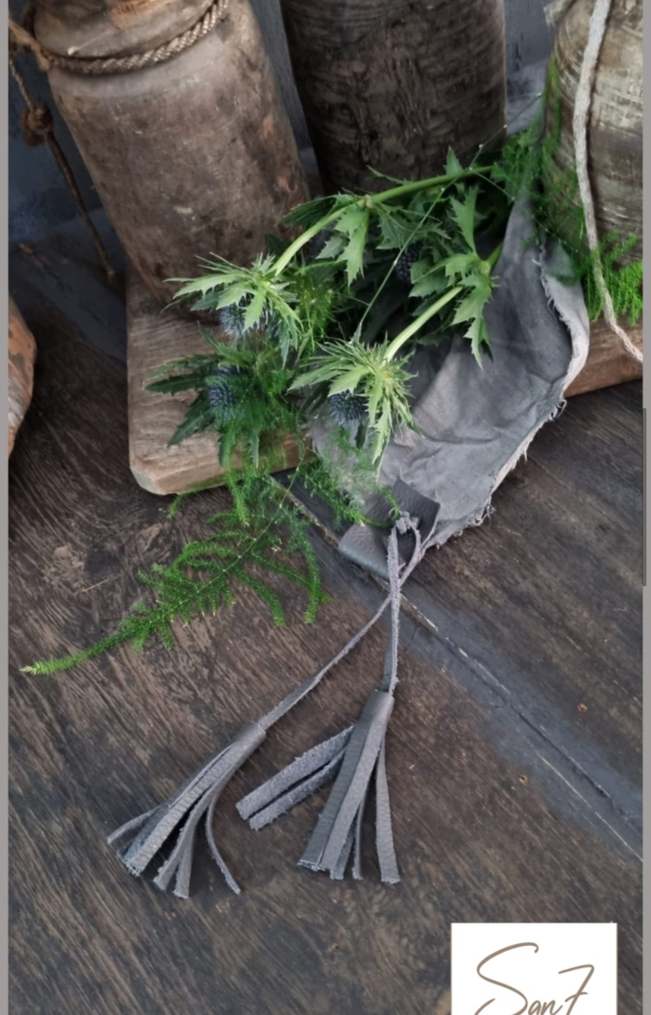 Linnen doek met lederen franje