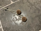 Fluffy bollen op stok  taupe