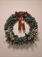 Krans in jute met witte bloemen 60cm