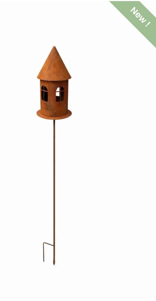 Huis met vogeltjes op stok roest
